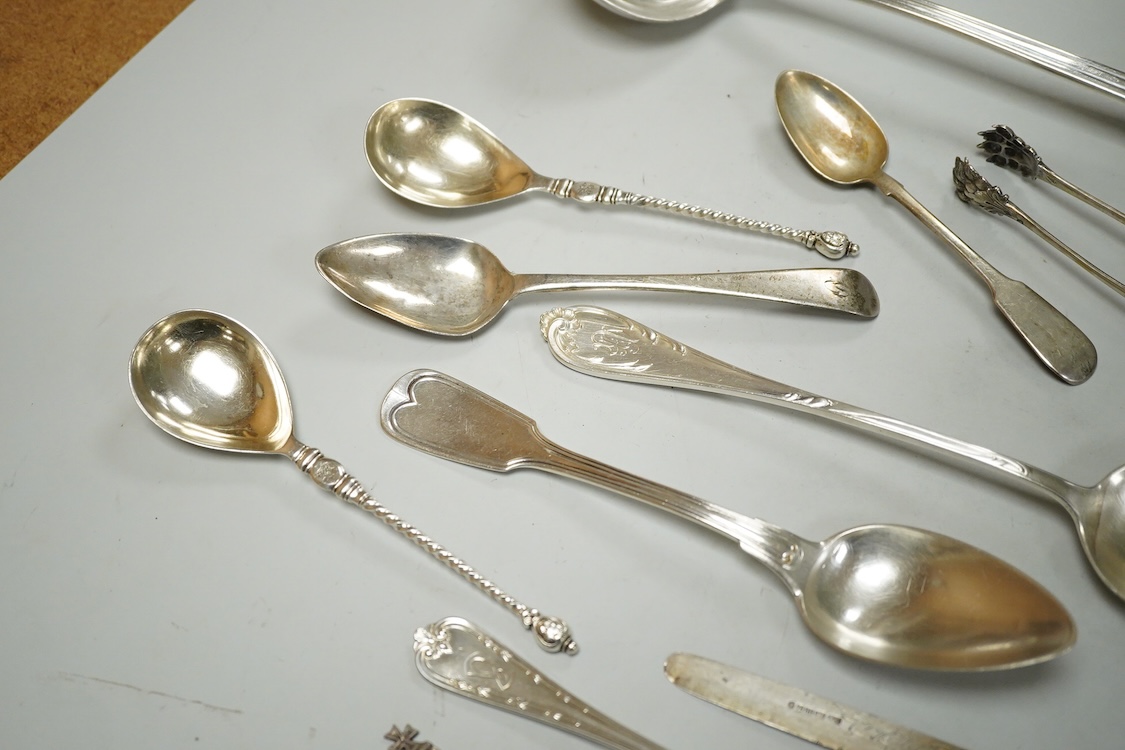 A George III silver Old English pattern dessert spoon, London, 1807, a later silver teaspoon and ten other items of white metal cutlery including a soup ladle, German tablespoon, pair of sugar tongs etc.